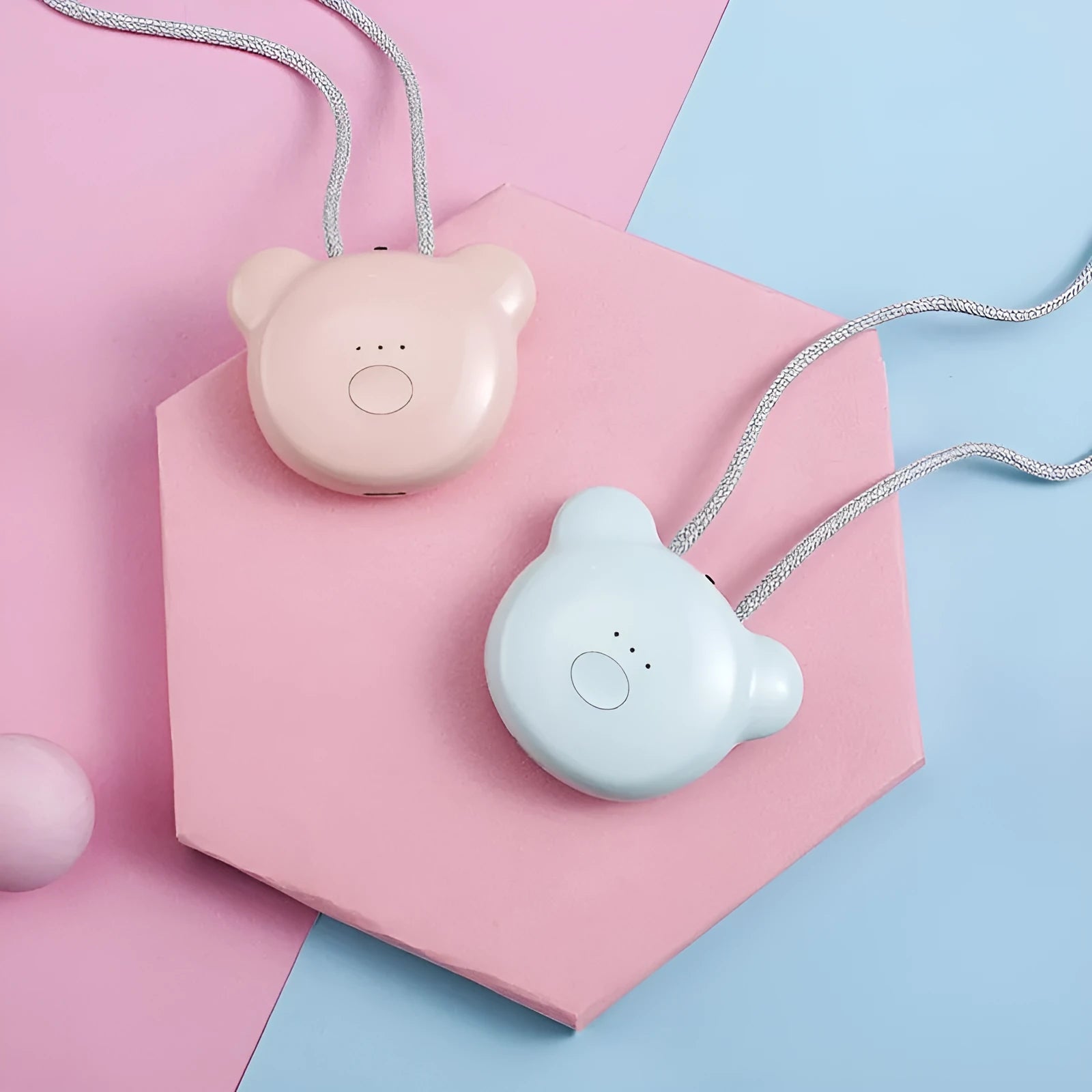 Mini USB air purifier necklace in pink showing compact wearable design with one-button control