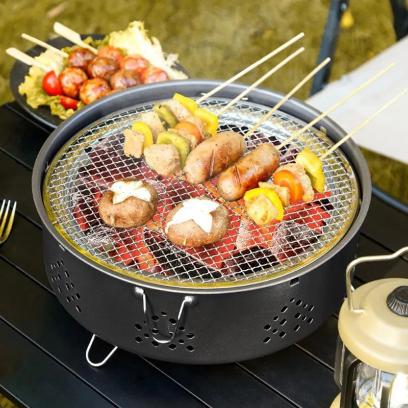 Portable stainless steel barbecue grill with detachable design and storage bag for outdoor cooking