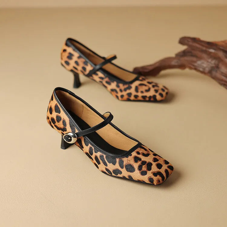 Women's black square toe stiletto ankle-strap high heel shoe made from horse hair.