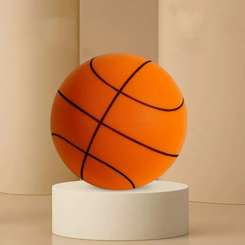 Assorted bright coloured silent high-density foam basketballs in different sizes with a basketball frame.