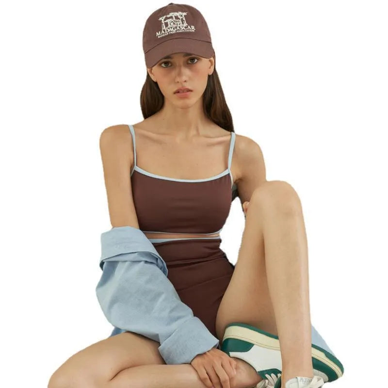 Brown nylon one-piece triangle swimsuit for women laid flat.