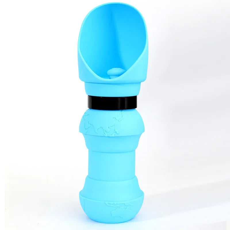 A folded and unfolded silicone water cup for pets, shown in green pineapple colour.