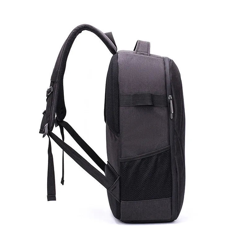 Black waterproof Oxford cloth drone backpack with 52cm dimensions and multiple zipper pockets for camera and laptop storage