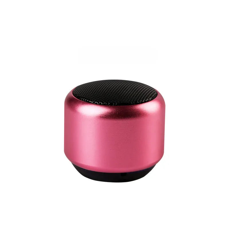 Portable mini Bluetooth speaker in black, blue, gold, or pink colour with compact design