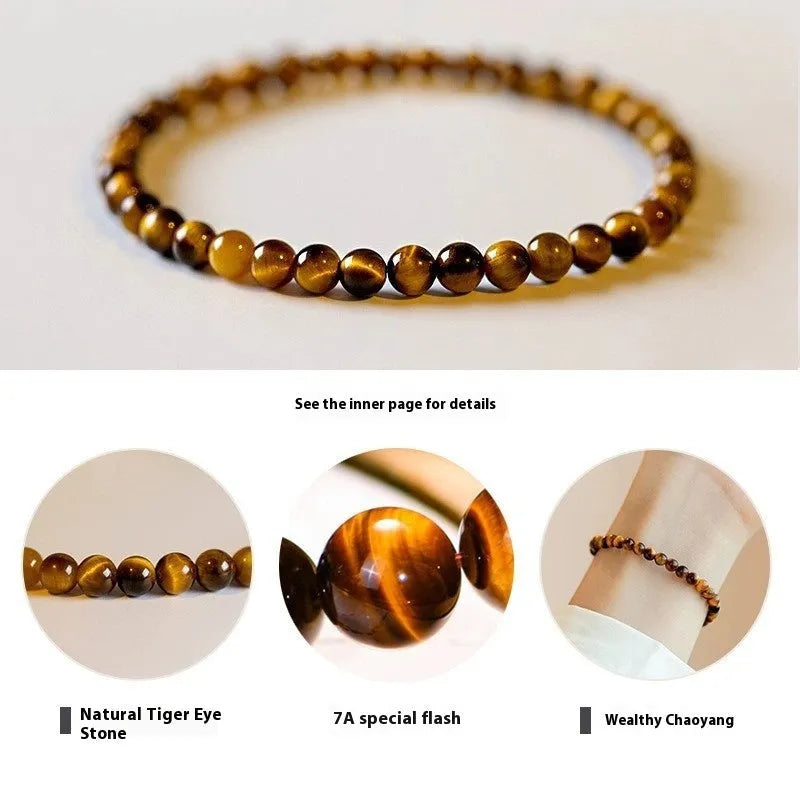 Natural tigereye gemstone bead bracelet in New Chinese geometric style on a wrist.