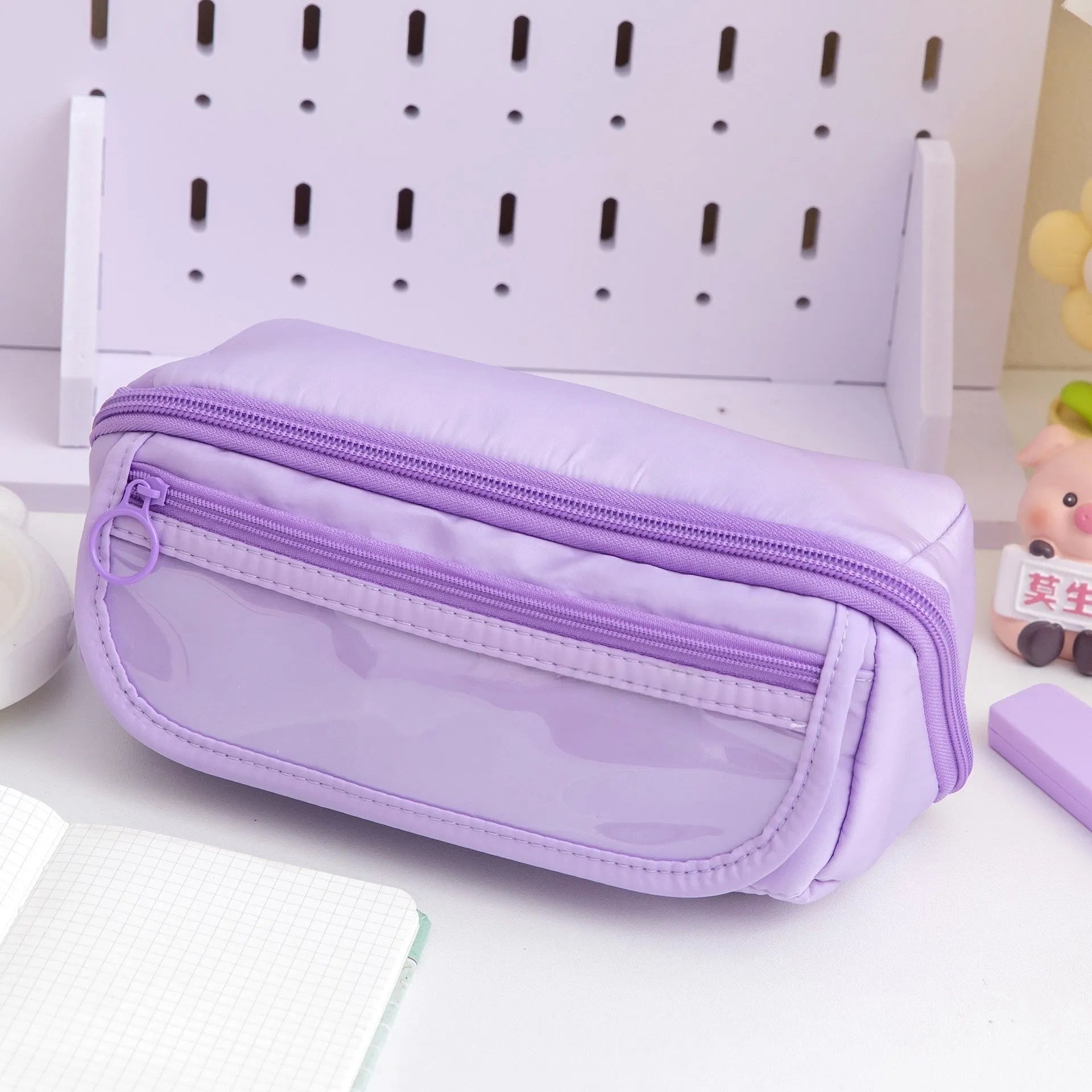 Korean-style canvas pencil case with a ten-layer flip design shown in various colours.