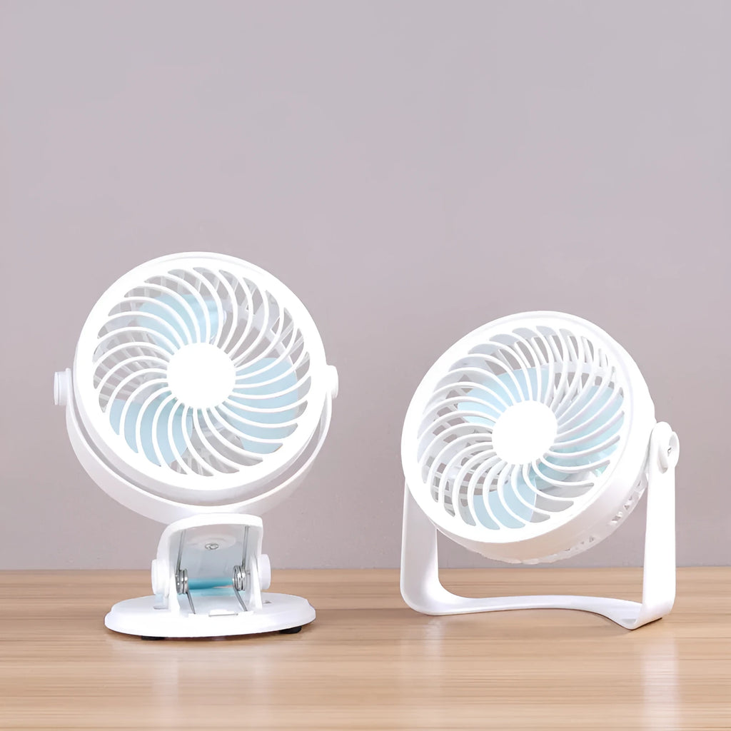Compact USB desktop fan shown as both a clip-on model and a floor-standing model on a wooden desk.