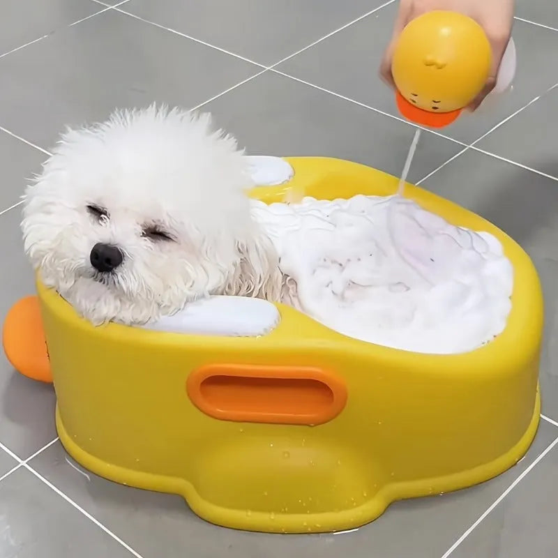 Blue PVC duck-shaped pet bathtub for dogs and cats on a white background.