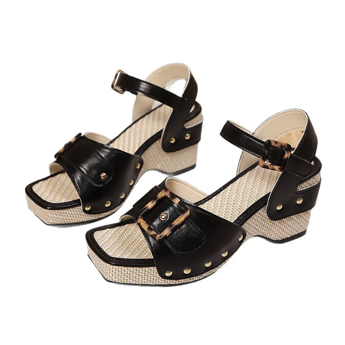 Women's black chunky heel sandals with a large square metal buckle over the instep.