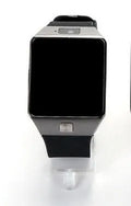Black Bluetooth smart watch with 1.44-inch touch screen on a wrist, showing time display.
