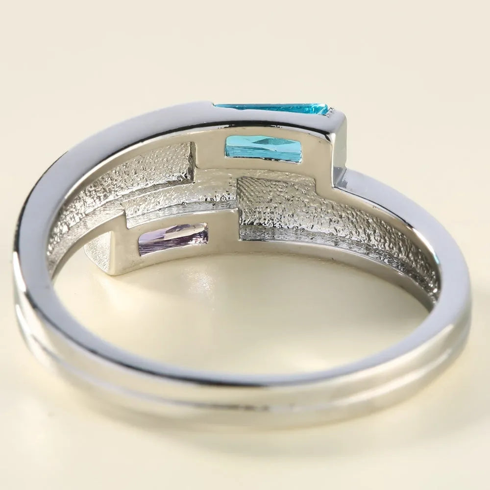 Silver electroplated copper ring with zircon stone geometric design on hand