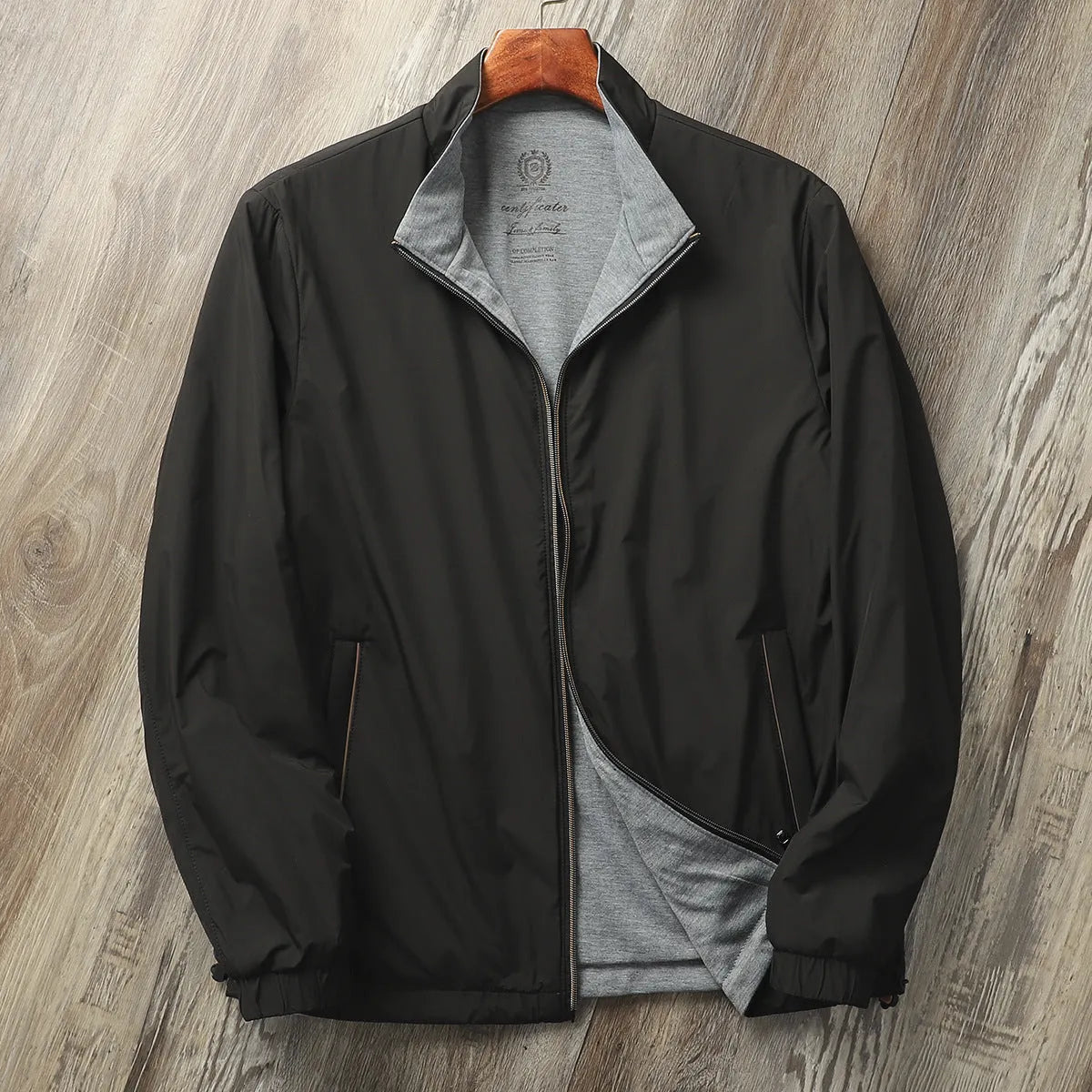 Men's stand collar simple jacket in a polyester blend fabric shown in Army Green colour.