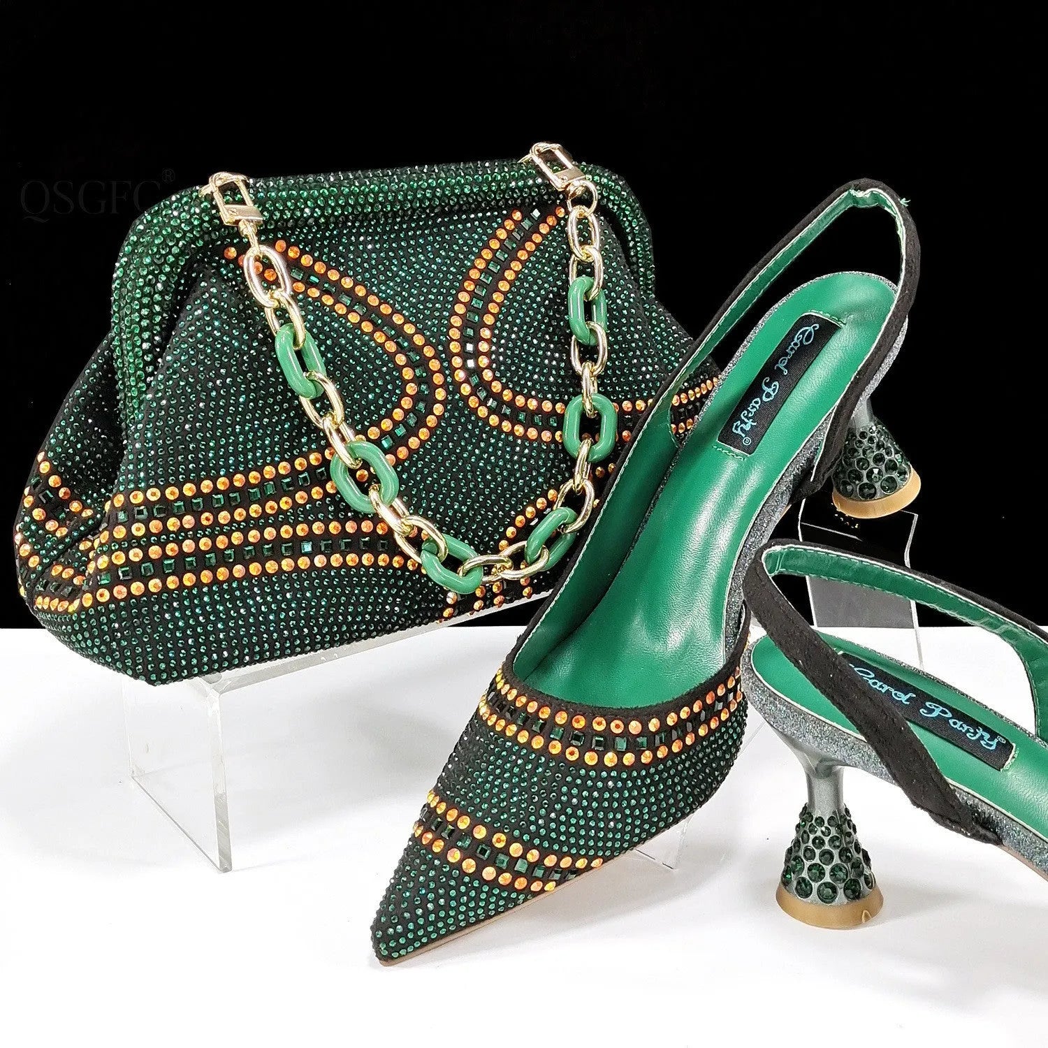 Women's pointed-toe high heel shoes with matching bag, featuring a stiletto heel and rhinestone detail on a synthetic leather upper.
