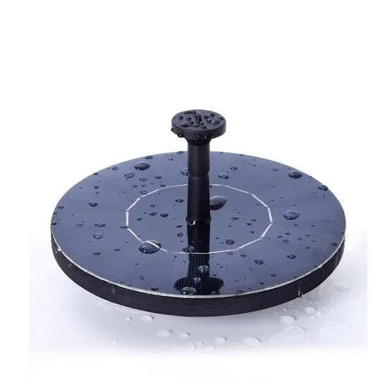 Black solar-powered floating fountain pump with four spray nozzles on a solar panel for garden ponds