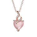 Women's rose gold heart pendant necklace with pink crystal on cross chain