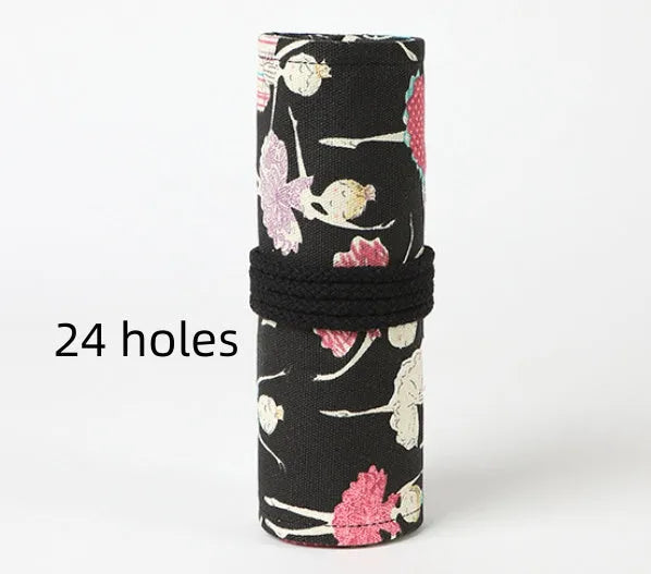 Square canvas pencil case with ballet girl print, showing multiple holes for storing sketching pencils and colour leads.