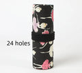 Square canvas pencil case with ballet girl print, showing multiple holes for storing sketching pencils and colour leads.
