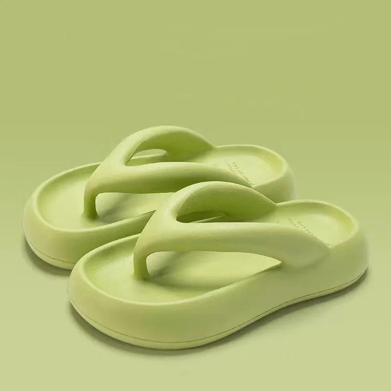 Solid colour thick-soled flip flops with decorative bow and injection moulded EVA construction