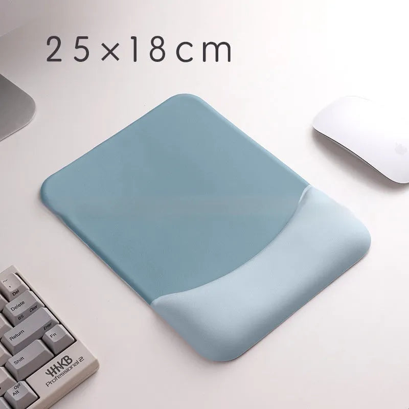 Square black silica gel wrist rest mouse pad with cloth surface on a desk.