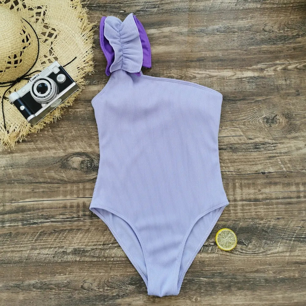 Single-shoulder high waist one-piece swimsuit for women in solid colour.