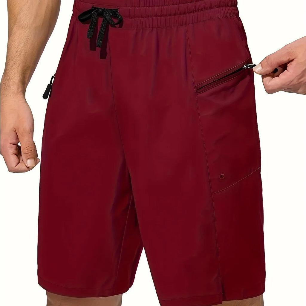 Men's solid colour quick-drying beach shorts in polyester fabric showing straight-leg cut