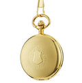 Retro mechanical pocket watch with floral print dial and transparent case back showing movement