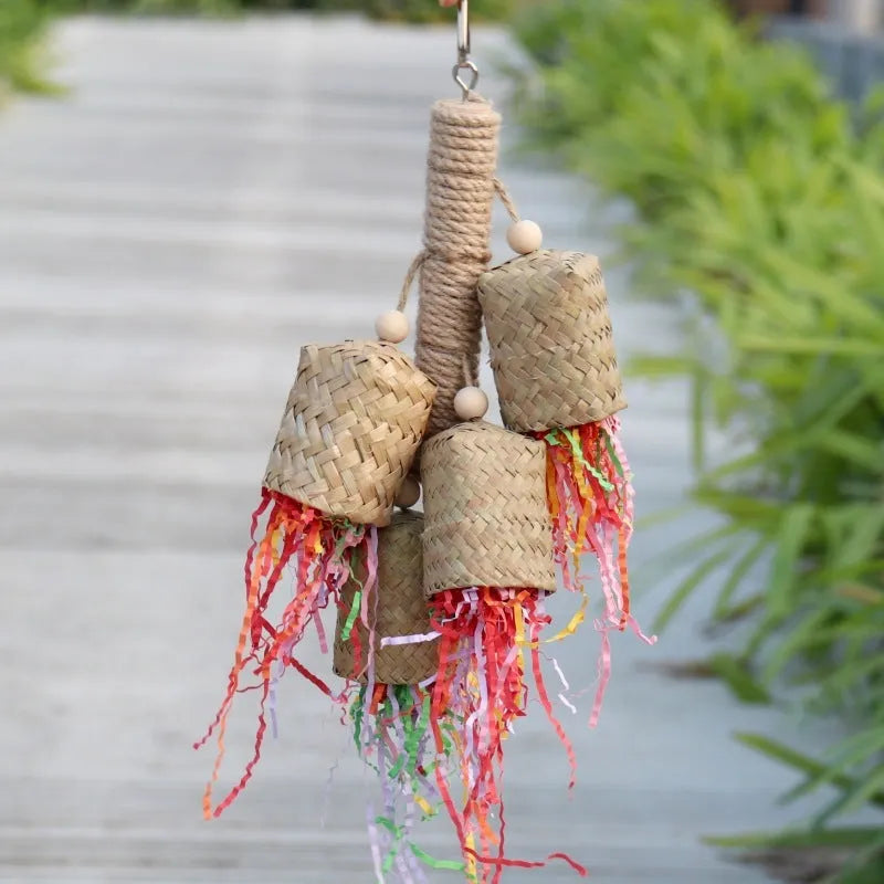Wooden frame parrot toy with sisal rope and colourful shredded paper strips measuring 15cm by 35cm
