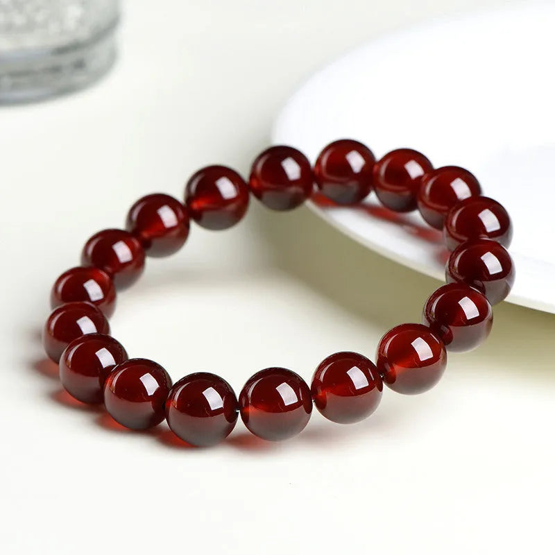Natural orange red garnet ball crystal bracelet with Ruyi design elements in retro style