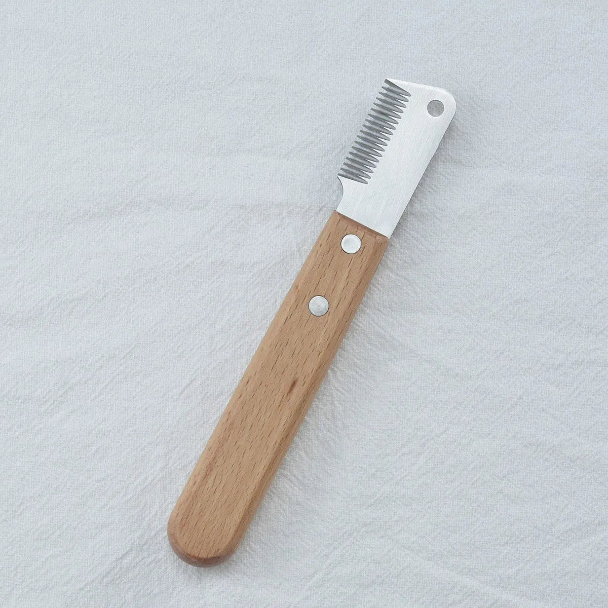 Pet stripping comb with wood handle and metal fittings for dog and cat grooming