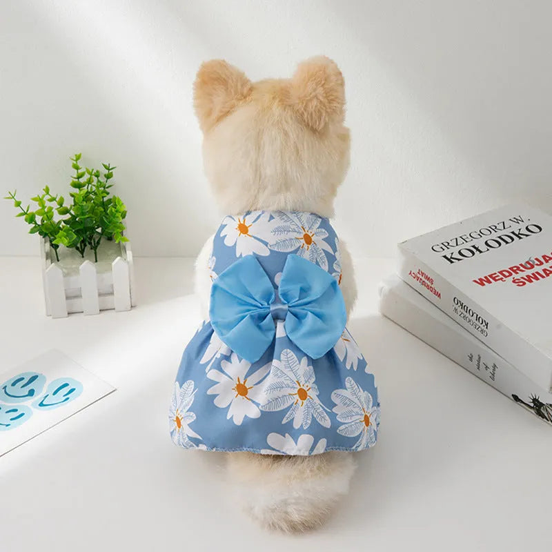 Orange bow floral butterfly knot ultra-thin polyester dress on a small dog.