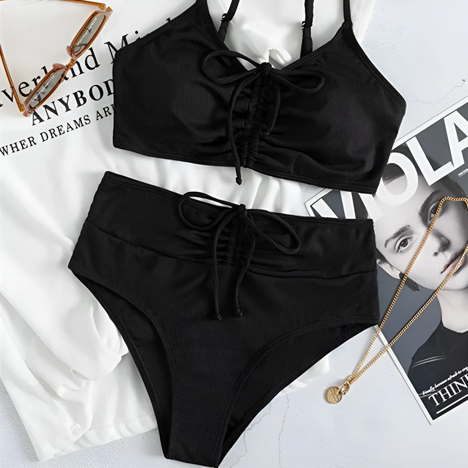 Black women's bikini swimsuit with high waist sling split bottoms and sleeveless top