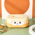 Square divided plastic lunch box in dark blue, orange yellow, or pink and green colours with cartoon style