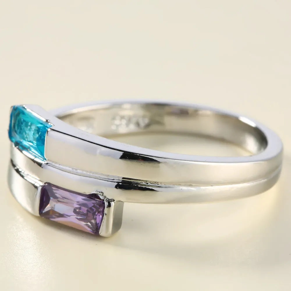 Silver electroplated copper ring with zircon stone geometric design on hand