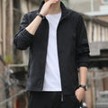 Korean style loose fit thin autumn jacket in blue with lapel collar and zip pockets.