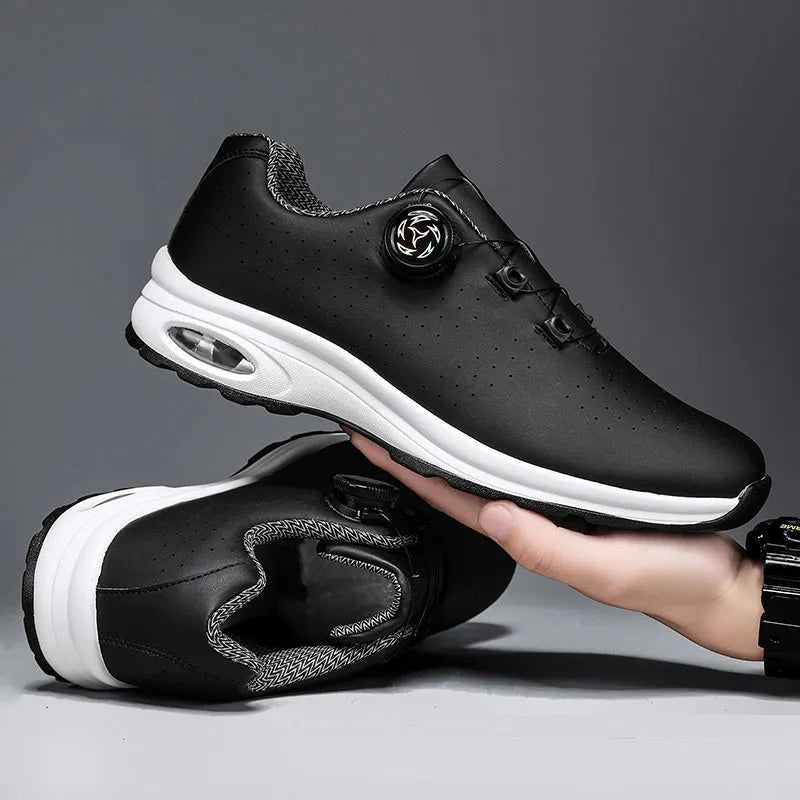 Black and white low-top mesh casual tennis shoes with lace-up front and cross shoulder straps