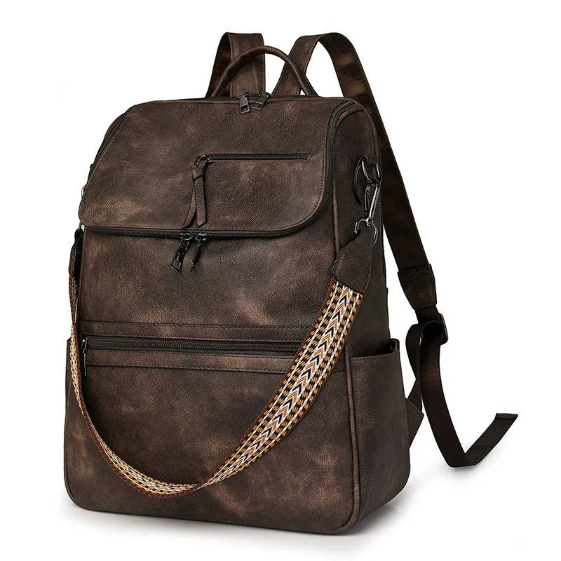 Retro college backpack with curved shoulder straps in multiple colour options including black, blue, grey, and coffee tones