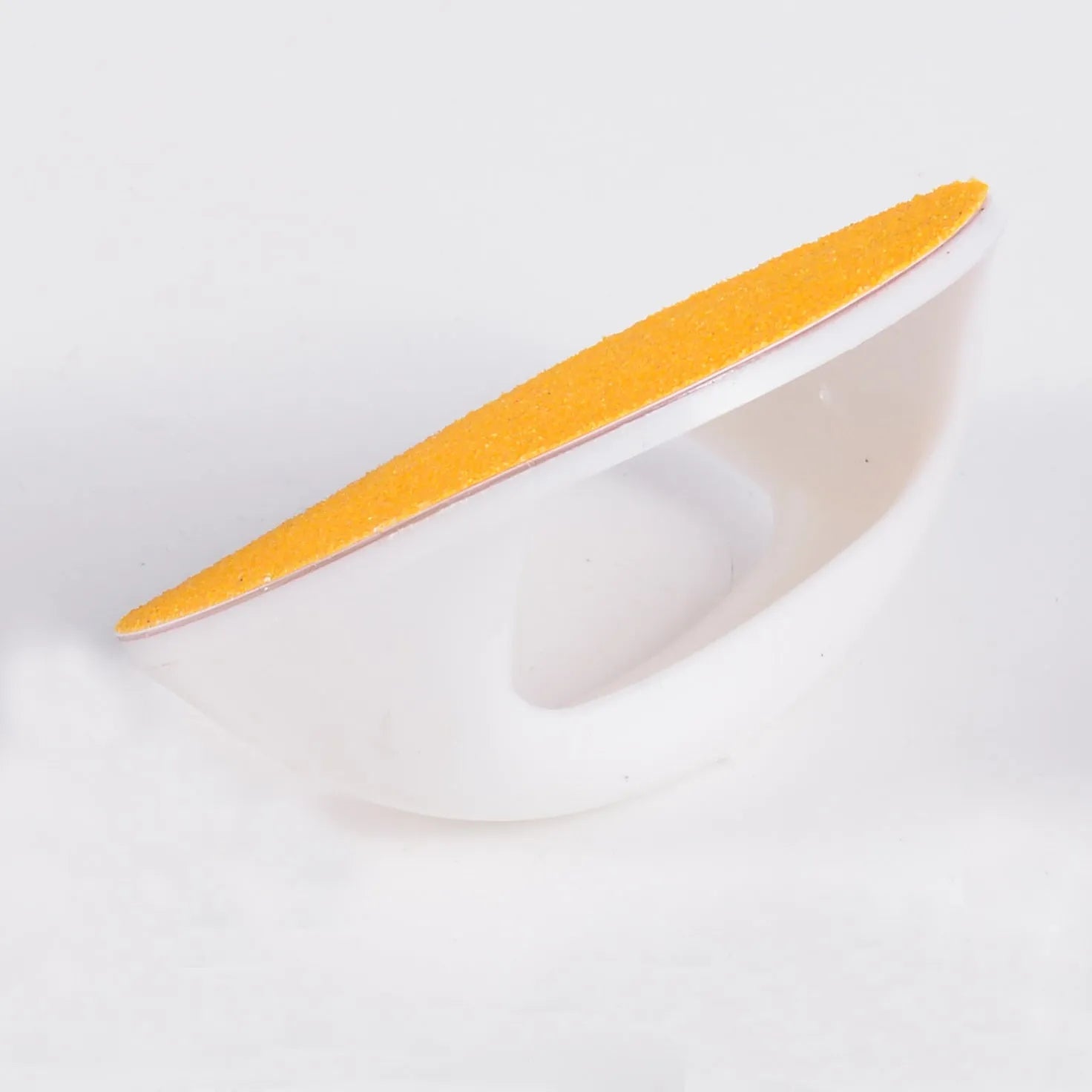Square dog nail file grooming board with ergonomic handle in one of four colour options.
