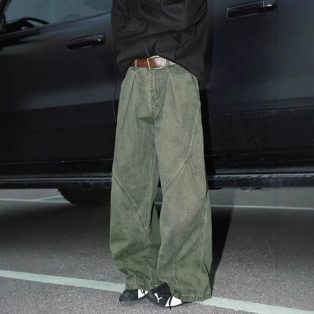 Men's pleated straight-leg trousers in apricot colour showing elasticated waistband detail.