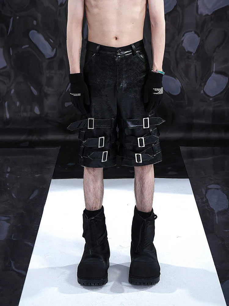 Men's black PU leather ring casual shorts made from stretch spandex fabric.