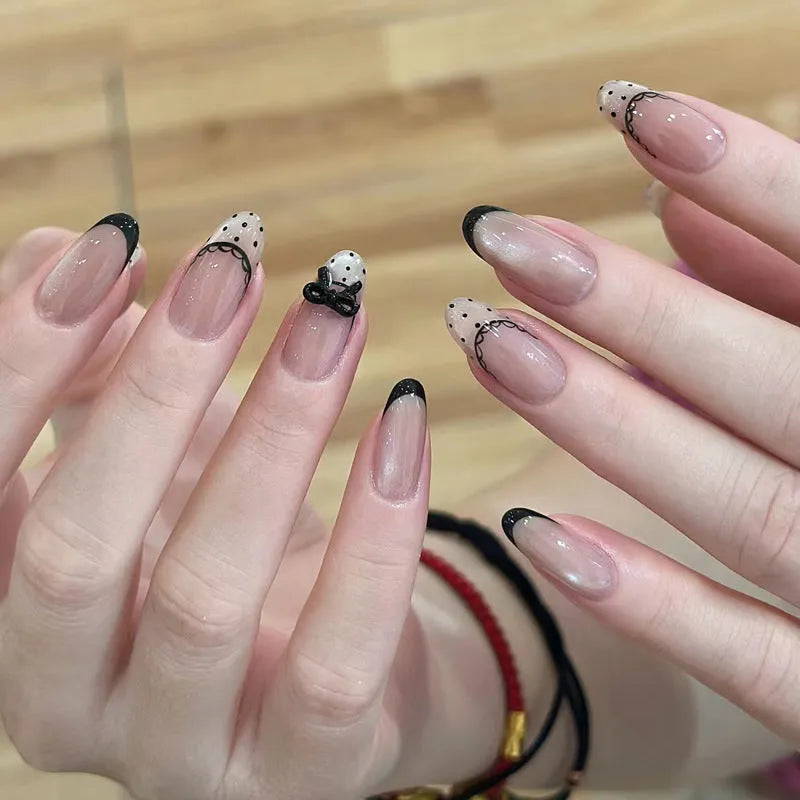 False nails sets for girls showing floral and glitter designs on short oval and stiletto nail shapes
