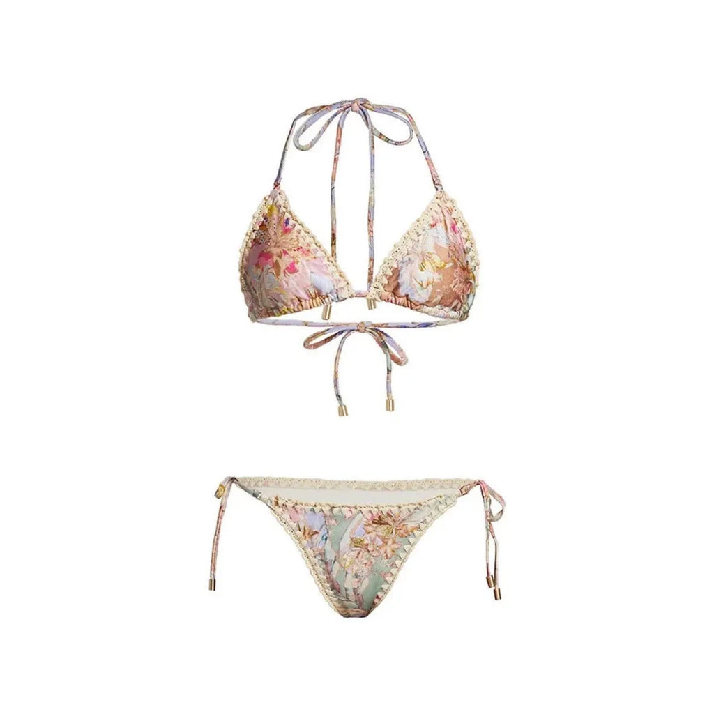 Women's creamy white floral print bikini set with matching skirt for swimming