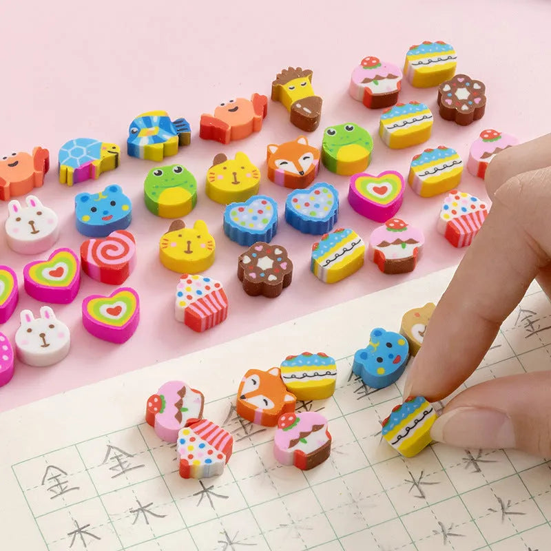 50 colourful cartoon mini erasers in shapes of fruits, animals, and cakes, displayed next to a pearlescent film bag.