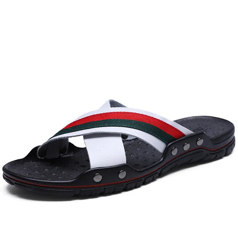 Men's cowhide leather beach sandals in white, shown from a side angle on a sandy background.