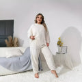 Women's milky white polyester plush two-piece casual suit with crew neck top and trousers