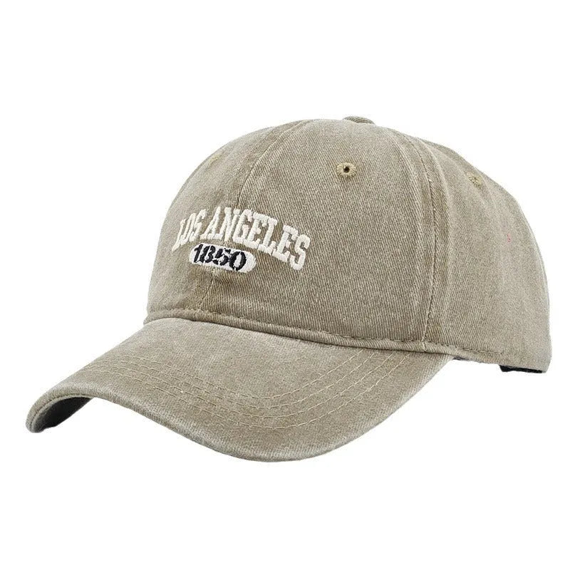 Retro personalised embroidered peaked cap in acrylic fabric with adjustable fit and distressed lettering