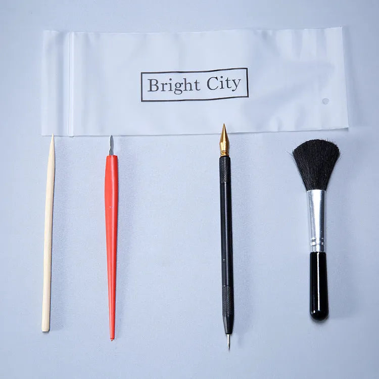 Scraping painting tool set with scratch pens, small scrapers, and white card paper for texture art