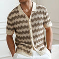 Short-sleeved yellow hollow jacquard corrugated sweater with flocked detail on a mannequin.
