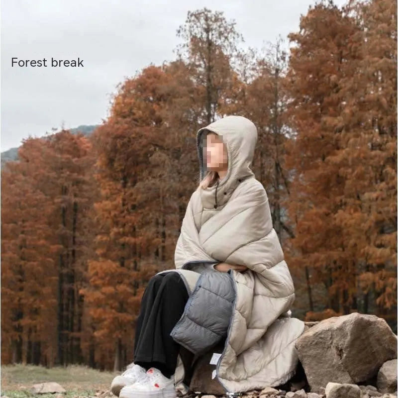 Army green outdoor cloak sleeping bag laid flat showing its 200x140cm size and wearable hood design.