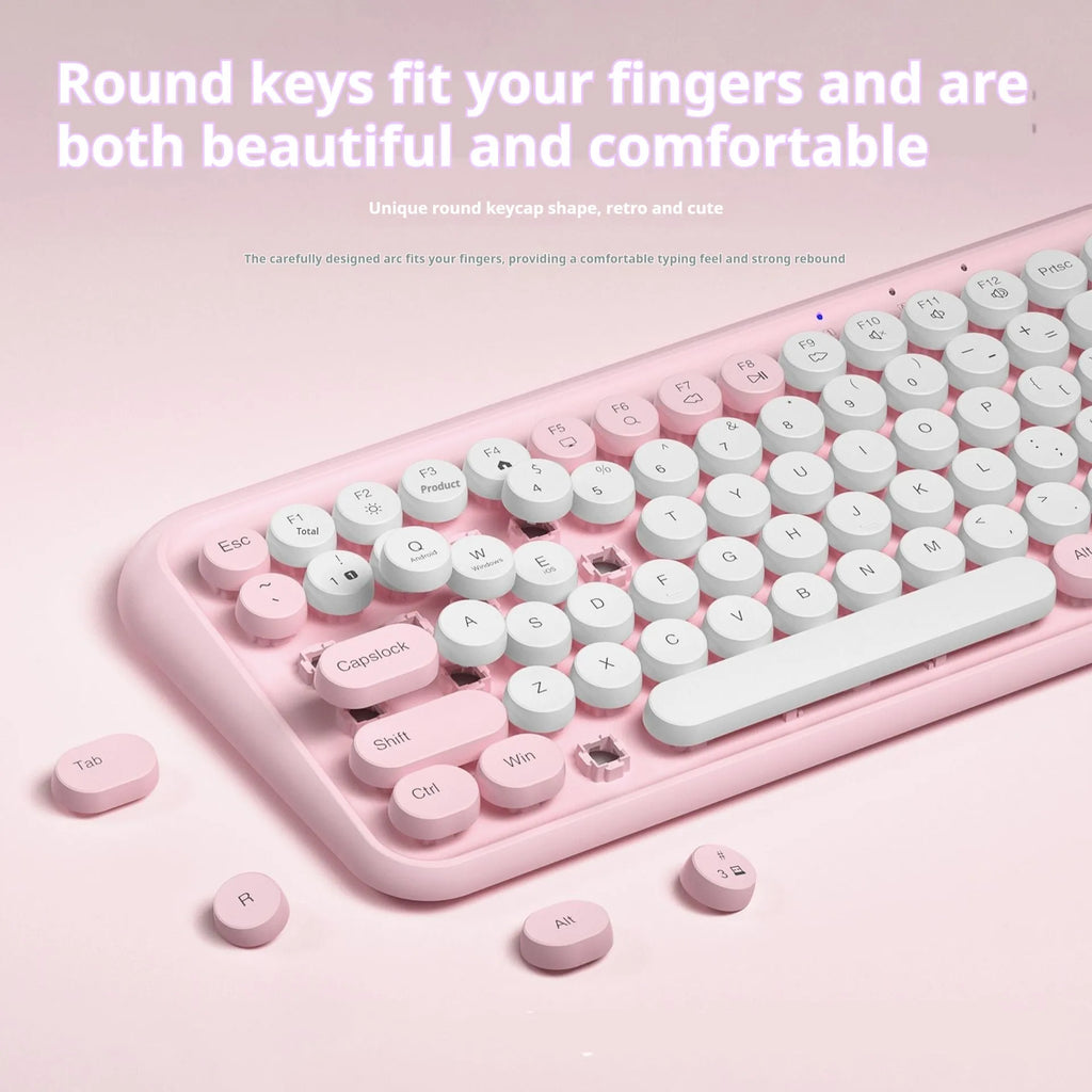 Pink wireless Bluetooth mechanical keyboard with 84 keys and compact portable design