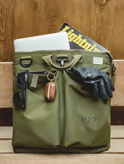 Marden Tooling charcoal black nylon canvas messenger bag with shoulder strap shown open.